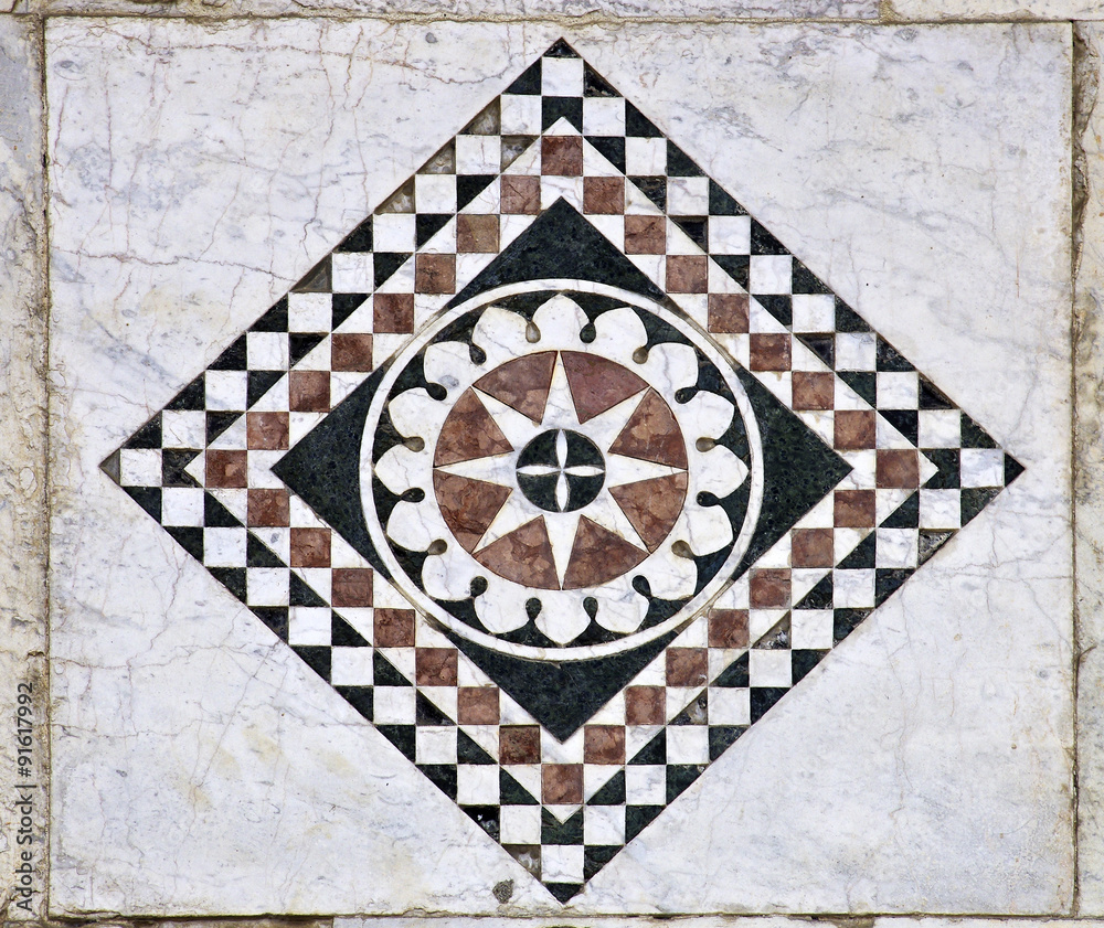Marble ornament from wall of Cathedral of St Martin in Lucca in