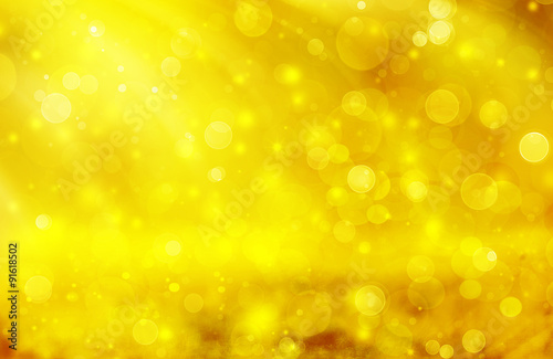 yellow abstract background with bokeh defocused lights