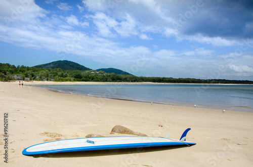 Surfboard on a sandy beach
