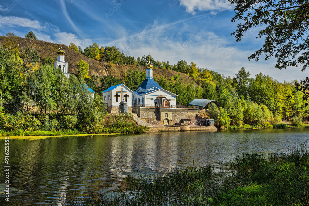 Russian Orthodox Church on the shore of a pond