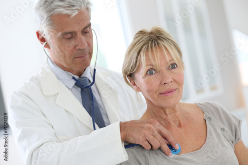 Senior woman in doctor's room for consultation