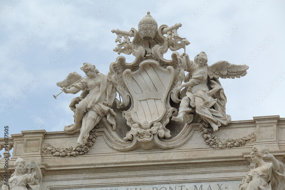 Papal Coat of Arms on Palazzo Poli Facade in Rome