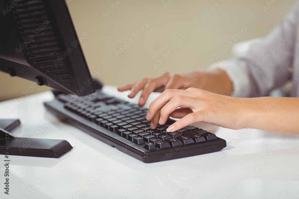 Woman working on computer Woman working on computer