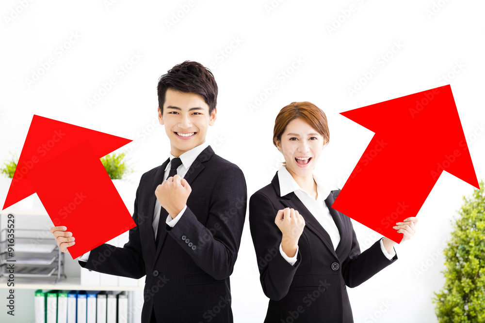 happy business man and woman standing in office happy business man and woman standing in office