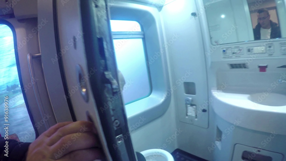 train passenger pov, open and enter the toiletr. UHD 4K stock footage train passenger pov, open and enter the toiletr. UHD 4K stock footage