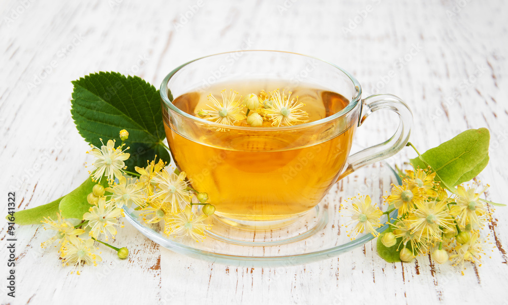 Cup of herbal tea with linden flowers Cup of herbal tea with linden flowers