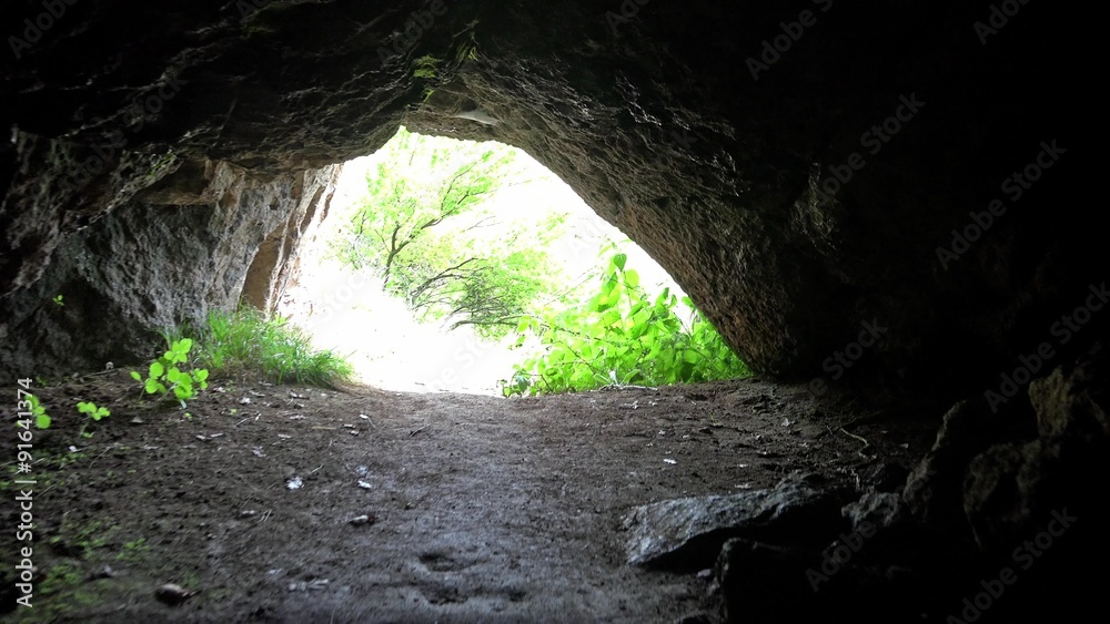 Escaping out of underground cave. UHD 4K stock footage Escaping out of underground cave. UHD 4K stock footage