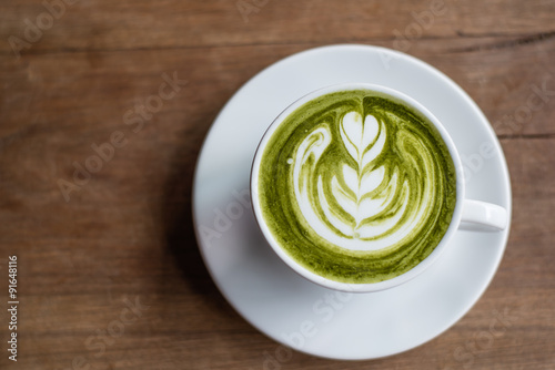 Matcha Latte on Wooden Background