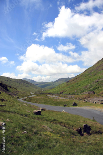 Lake District (UK) valley with road running through © JHMimaging