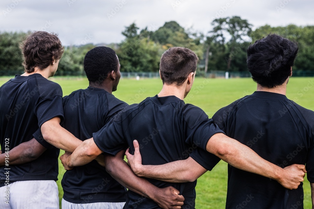Naklejka premium Rugby players standing together before match
