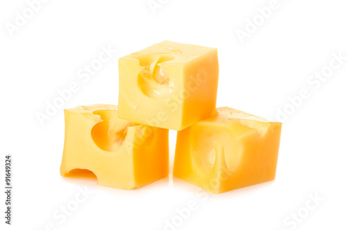 three dice yellow cheese with holes in isolation