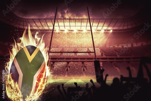 Composite image of silhouettes of football supporters