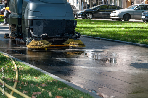 process of cleaning walkways in the Park machine