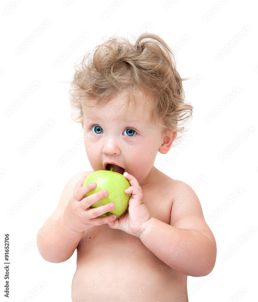 baby biting a green Apple on white background baby biting a green Apple on white background