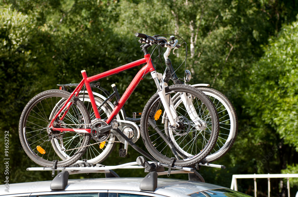 transportation of bicycles on the roof of the car transportation of bicycles on the roof of the car