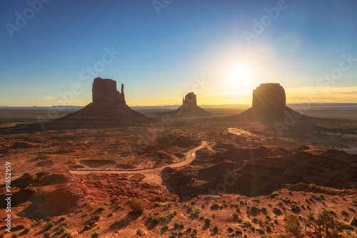 Dawn sunshine over the Monument Valley, desert canyon in USA photo