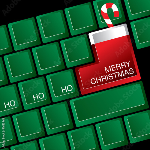 A computer keyboard where the return key is a Christmas stocking