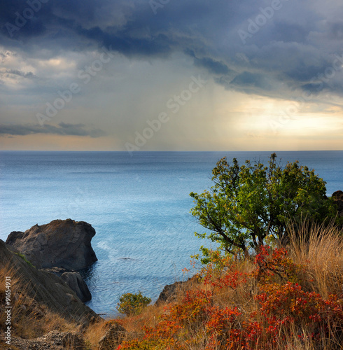 Rain on Cape Meganom, Black Sea, Crimea photo