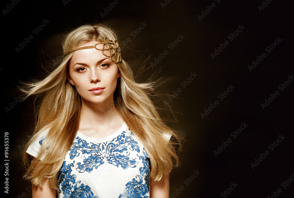 Fototapeta premium Portrait of beautiful blonde woman in white elegant dress with