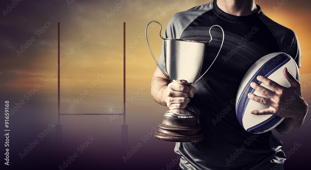Composite image of midsection of successful rugby player
