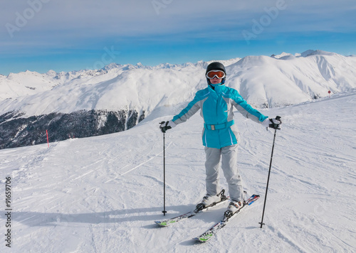  Skier mountains in the background. Ski resort Livigno. Italy