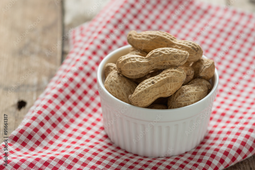 Peanut in white bowl. Peanut in white bowl.