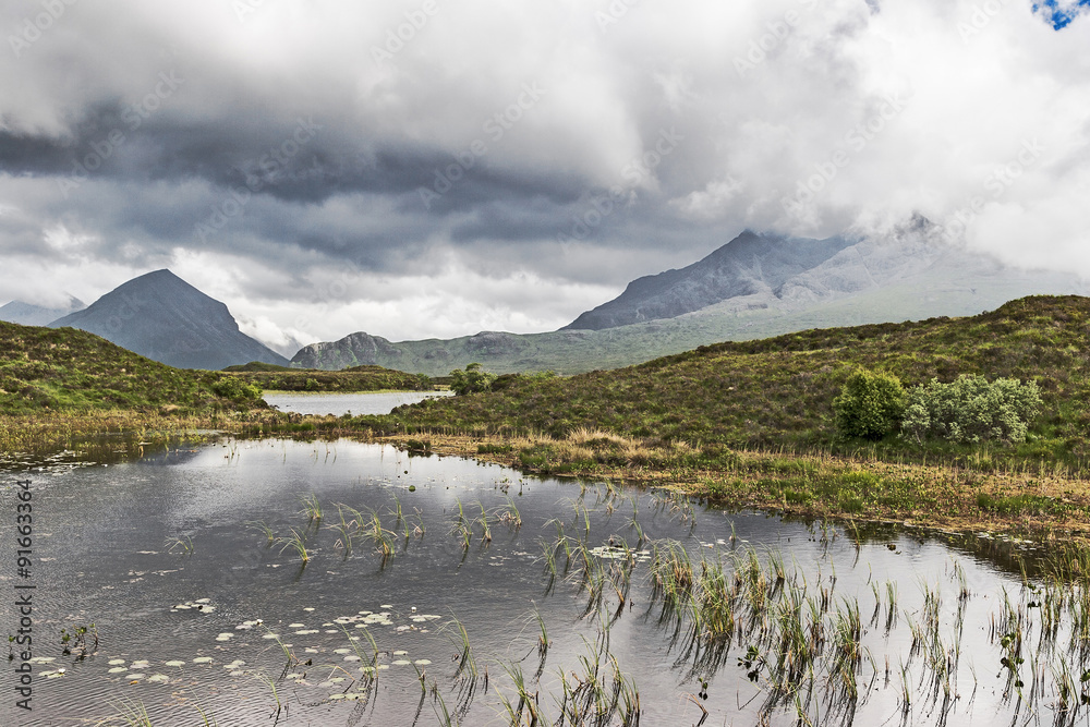 Obraz premium Fiary pools and cloud covered Cuillins of the Isle of Skye