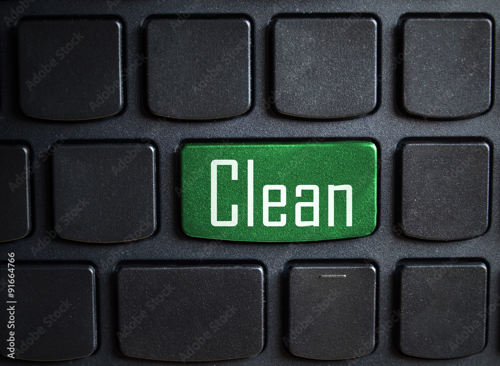 Clean word on green button on computer keyboard Clean word on green button on computer keyboard