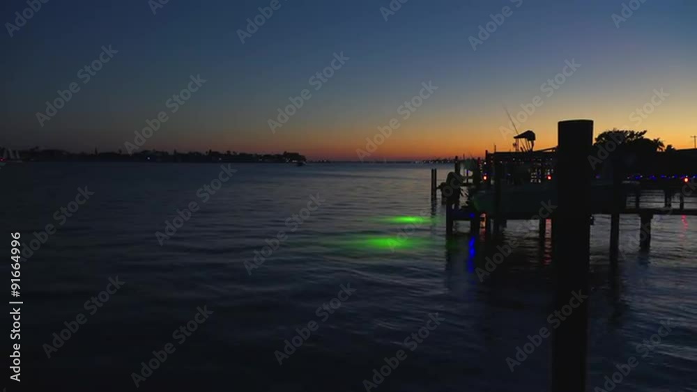 A shack or wooden shanty on a pier at sunset. A shack or wooden shanty on a pier at sunset.
