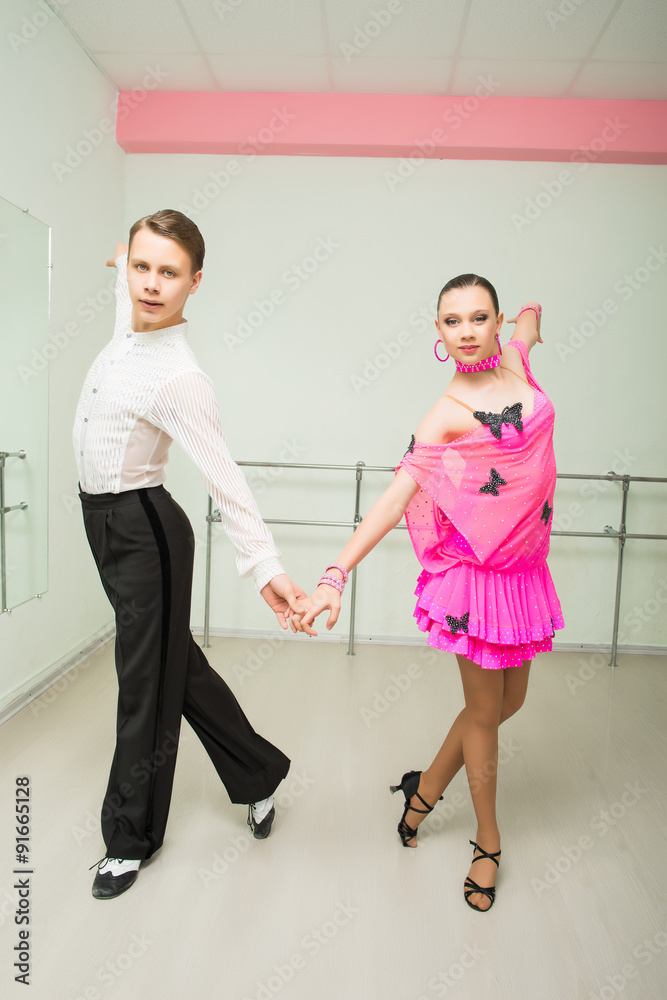 Fototapeta premium Dancing, ballroom dancing, dance studio, man and woman