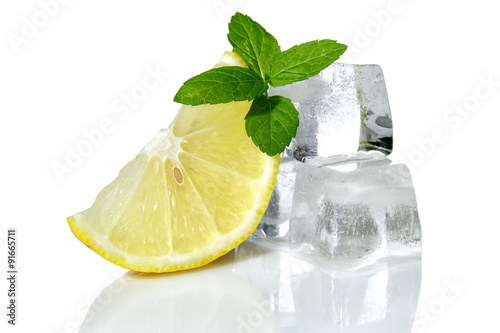 Lemon with mint and ice cubes