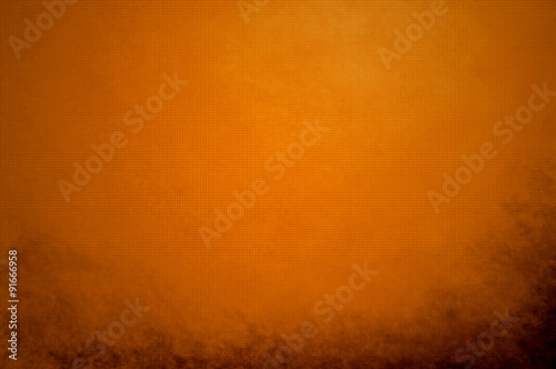abstract orange background peach color center spotlight, dark br