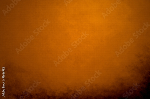 abstract orange background peach color center spotlight, dark br