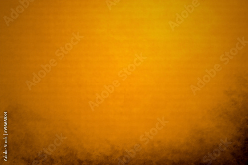 abstract orange background peach color center spotlight, dark br