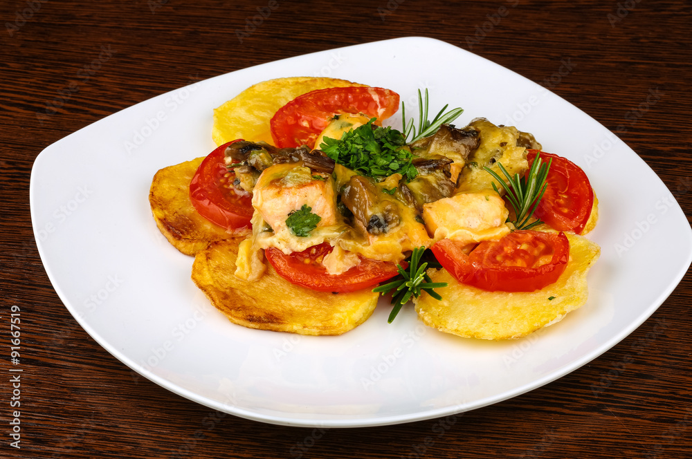 Roasted salmon with potato and tomato Roasted salmon with potato and tomato