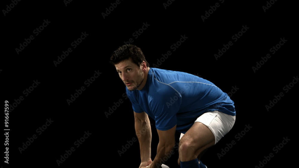 Serious rugby player playing in slow motion Serious rugby player playing in slow motion