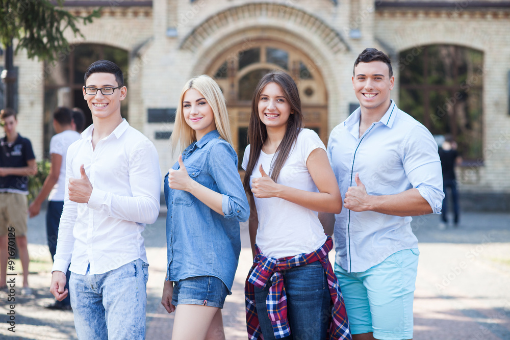 Attractive young students are expressing positive emotions Attractive young students are expressing positive emotions