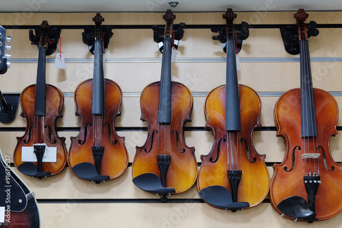 The image of a violins in a shop