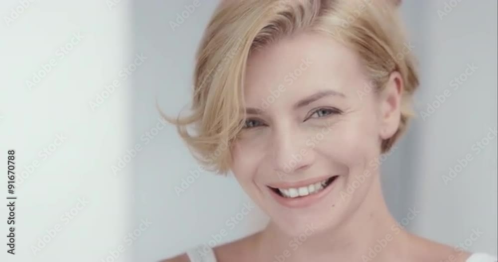 Beautiful young woman closeup portrait smiling in lifestyle luxury home Beautiful young woman closeup portrait smiling in lifestyle luxury home
