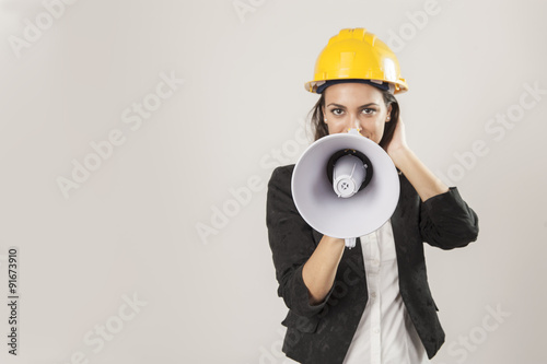 Female construction worker with Megaphone photo