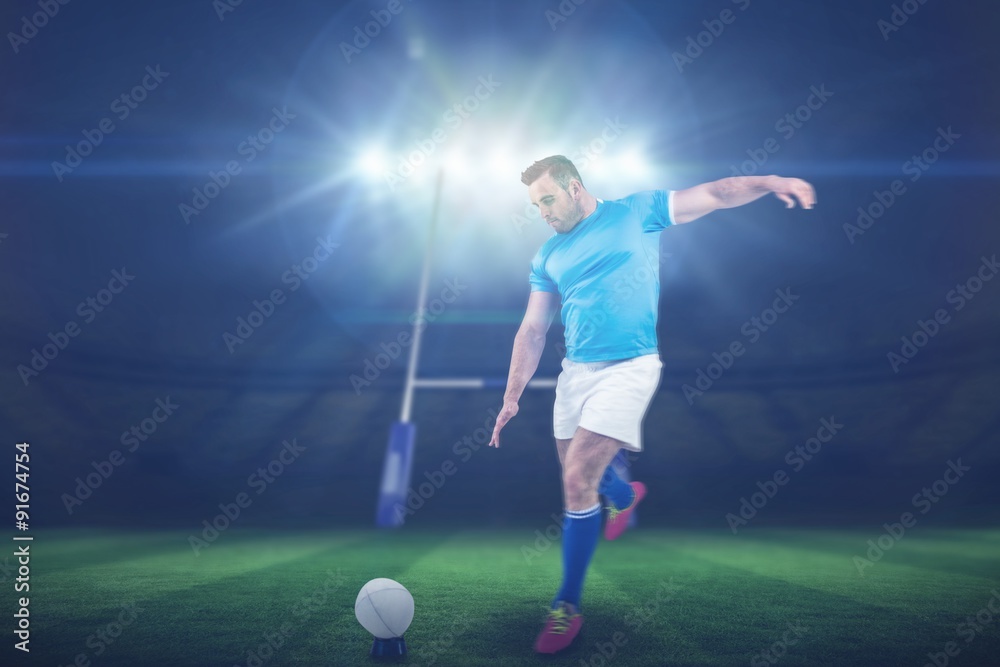 Composite image of rugby player ready to kick Composite image of rugby player ready to kick
