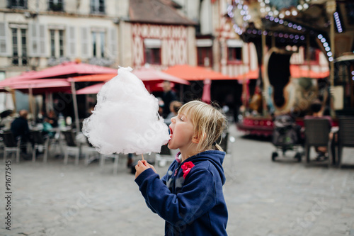 Little enjoying cotton candy, Dijon, France.