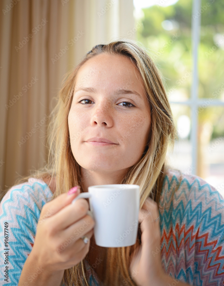 Woman drinking coffee in the morning at restaurant Woman drinking coffee in the morning at restaurant