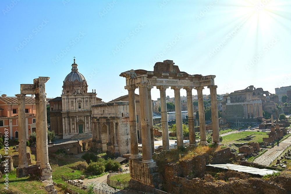 The roman forum and the monuments in the summer time