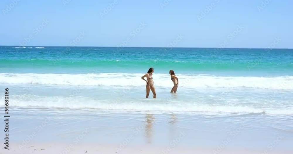 beautiful young woman swiming in ocean wearing bikini on tropical beach summer holiday,day,day beautiful young woman swiming in ocean wearing bikini on tropical beach summer holiday,day,day