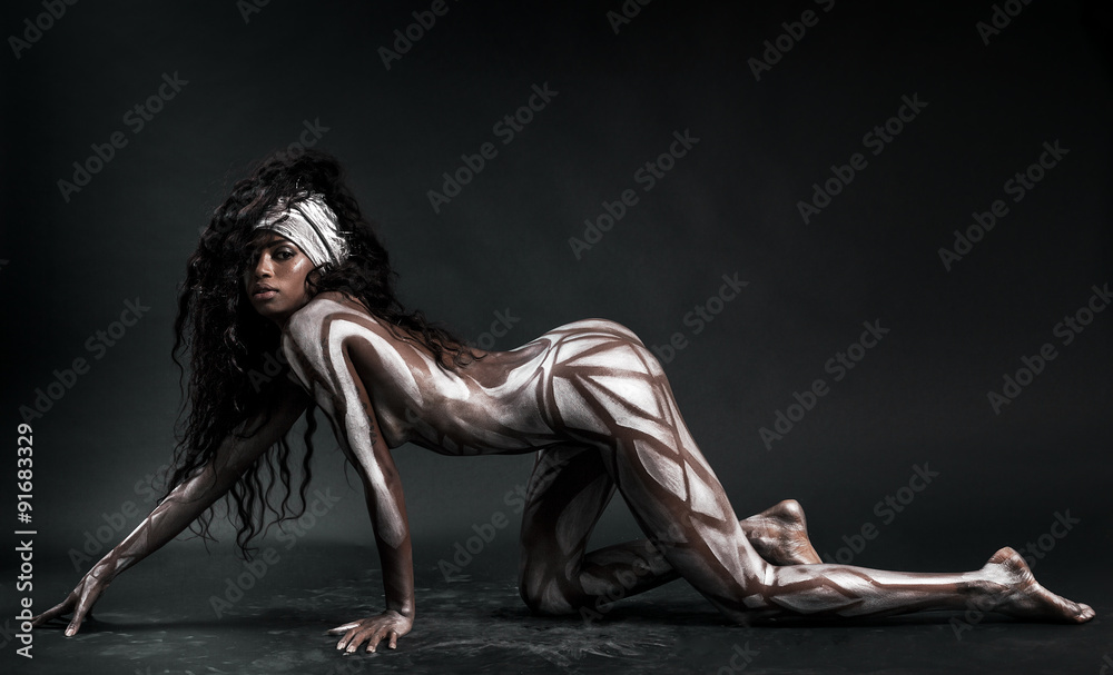 Fototapeta premium Sexy african model body painted with polygons