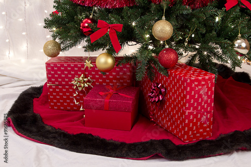 Christmas packages underthe tree photo