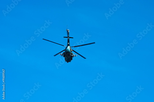 Fototapeta Naklejka Na Ścianę i Meble -  flying helicopter, view from below