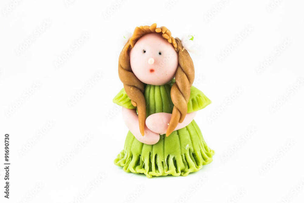 sculpture dolls on white background