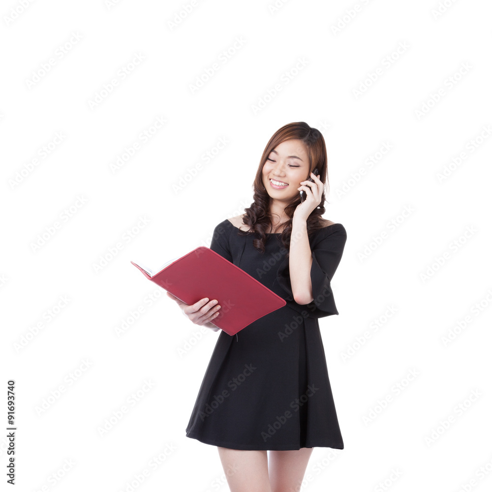 Businesswoman walking talking on mobile phone. Businesswoman walking talking on mobile phone.